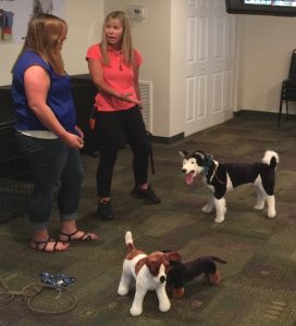 Louise Stapleton-Frappell (right) explains how to condition equipment so it has a positive conditioned emotional response